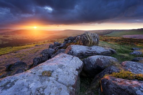 Stormy sunset at Carhead Rocks. Derbyshire Peak District.