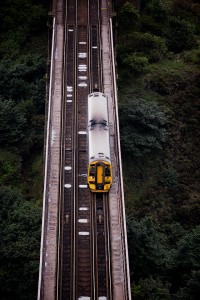 View down to the railway tracks from the top of the Forth Rail Bridge, looking towards North Queensferry, Firth of Forth, Scotland.
