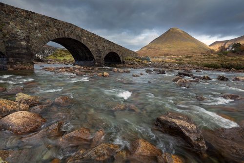 Old bridge over the River Sligachan, looking towards the Cuillin Mountains,