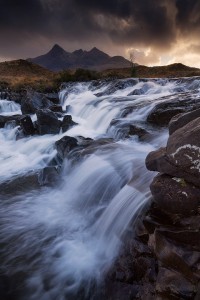One of the dramatic cascades on Alt Dearg Mor looking towards Sgurr nan Gilean, one of the most famous Cuillin peaks. Here the many cascades along the river are perfect as foreground for the surrounding Cuillin.