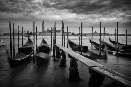 The iconic Ventian gondolas bobbing on the lagoon, looking towards San Giorgio Maggiore. This classic view from San Marco was particularly tricky as I didn't have my tripod with me at the time so I had to balance the camera on whatever I could find! This made composition very tricky but I'm happy with this classic view of Venice despite the challenges. 