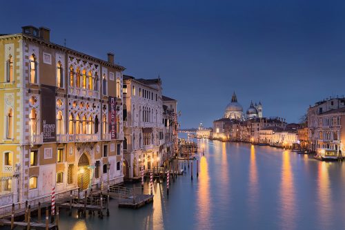 Blue hour overlooking the Venice Grand Canal (Canal Grande). This iconic view from the Ponte dell'Accademia looking towards the Basilica Santa Maria della Salute, is my favourite view in the beautiful city of Venice.