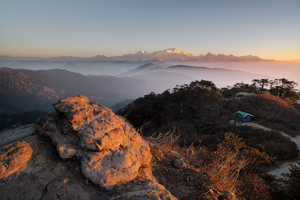 Kangchenjunga Sunrise. Wide angle view from the highest point at Sandakphu, West Bengal, India. looking towards the imposing Kangchenjunga range (8586 m).